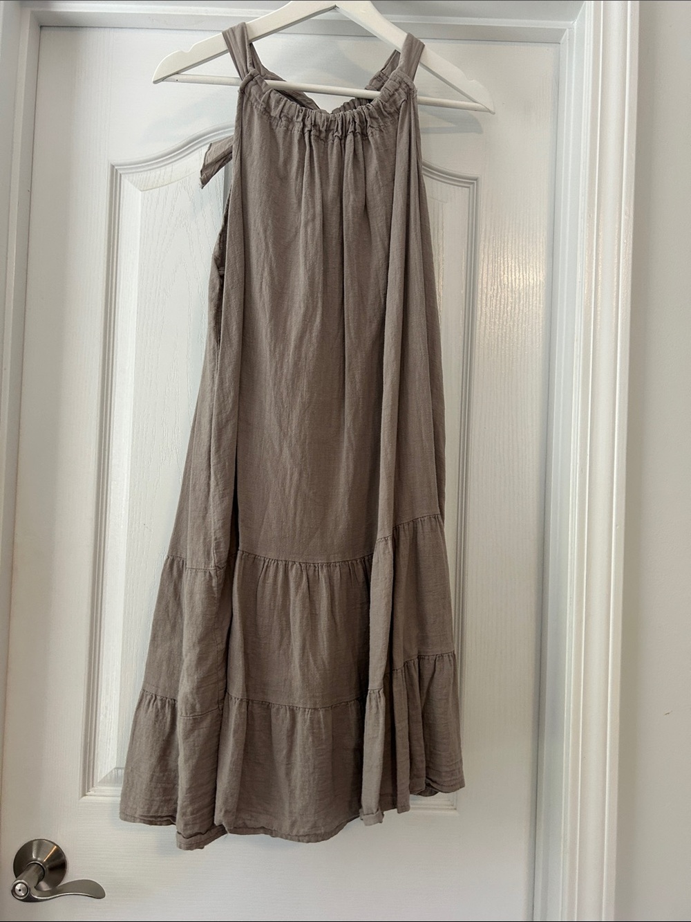 Taupe linen sundress with halter neck and bow tie back
